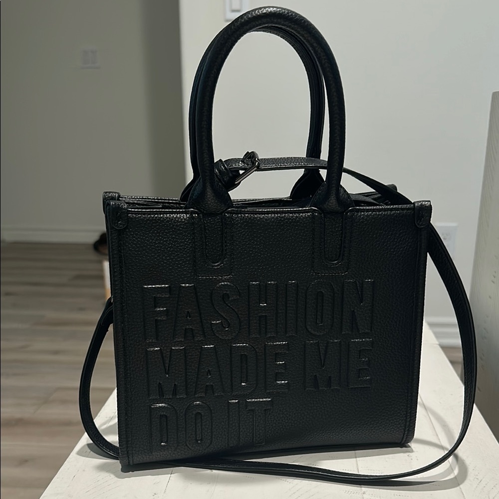 Black Leather Tote with Embossed Design and Crossbody Strap